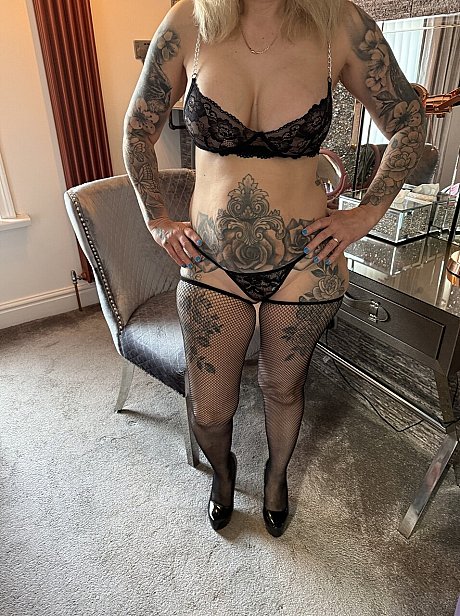 Tattooed mature broad Inked MILF goes topless in mesh pantyhose - Image 9 of 16  in Close Up category   featuring Inked MILF 