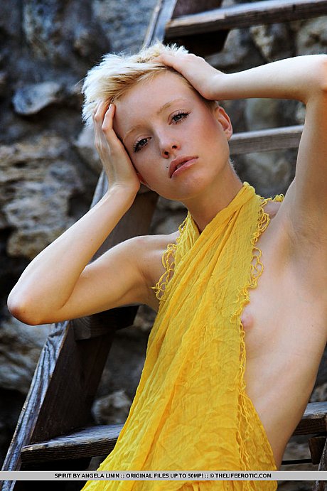 Blondy girl GF broad with short hair slips off yellow dress for nude poses in stone pit - Image 3 of 16  in Legs category   featuring Spirit 