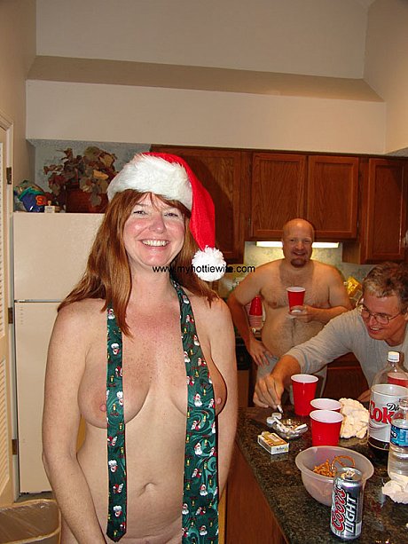 Charming older swingers doff their Xmas clothes and share penii on a bed - Image 21 of 21  in Amateur category   featuring Tracy Lick, Double Dee 