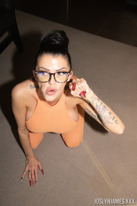 Curvaceous MILF Joslyn James teases with her huge breasts in a jumpsuit & heels - #509576