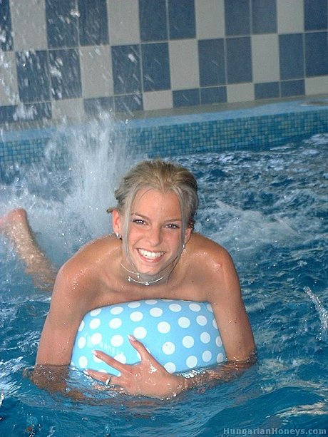 Charming yellow-haired teen Lilu plays nude in the pool before posing with two males - Image 2 of 21  in Pussy category   featuring Lilu 