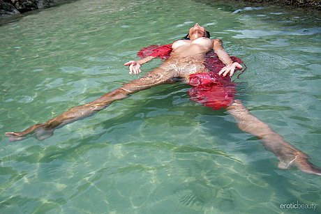 Brunette teenie Nov Lera plays with her hair while showing her melons in the ocean - Image 5 of 16  in Model category   featuring Nov Lera 