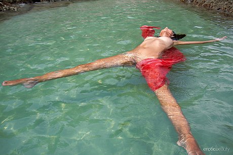 Brunette teenie Nov Lera plays with her hair while showing her melons in the ocean - Image 6 of 16  in Model category   featuring Nov Lera 