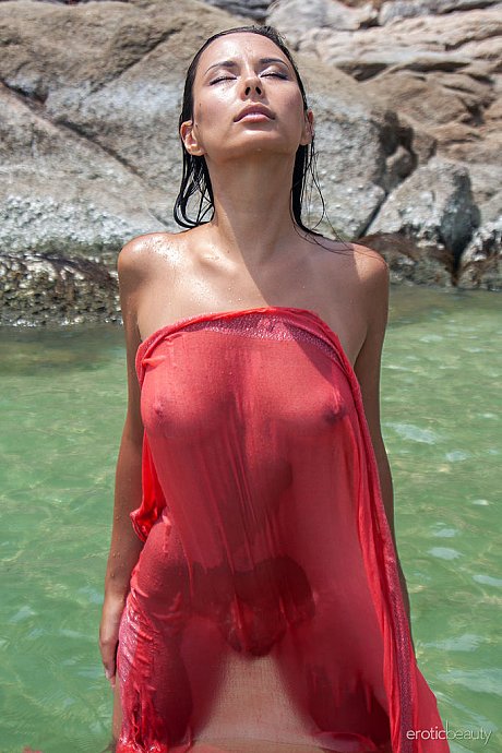 Brunette teenie Nov Lera plays with her hair while showing her melons in the ocean - Image 14 of 16  in Model category   featuring Nov Lera 