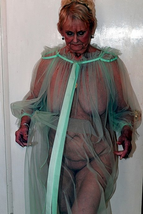 Old blonde Sparkle poses in a sheer garment while otherwise totally undressed - Image 9 of 16  in Legs category   featuring Sparkle 