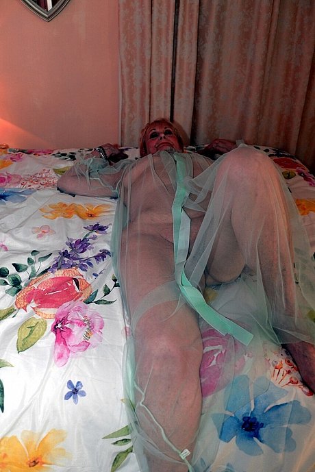 Old blonde Sparkle poses in a sheer garment while otherwise totally undressed - Image 11 of 16  in Legs category   featuring Sparkle 