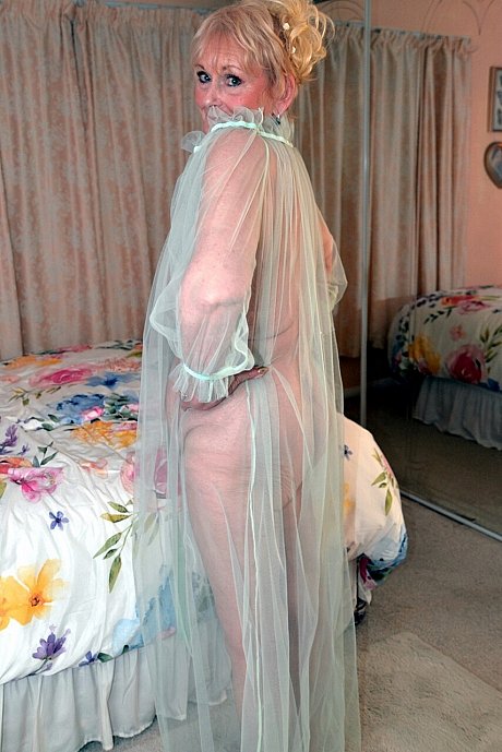 Old blonde Sparkle poses in a sheer garment while otherwise totally undressed - Image 16 of 16  in Legs category   featuring Sparkle 