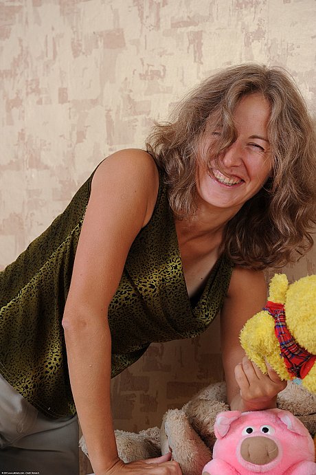 Huge MILF Olga strips fully naked & spreads her silky vagina up close - Image 1 of 20  in Close Up category   featuring Olga 