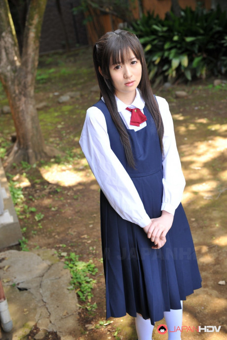 Charming Japanese babe posing in her attractive school outfit in the garden - #1036271