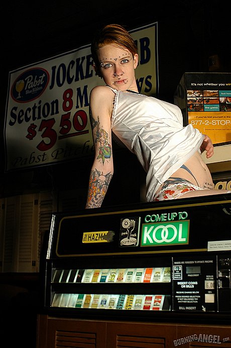 Babe with short hair and heavy tattoos is a striptease at an empty bar - Image 3 of 19  in Spreading category   featuring Rachel Face 