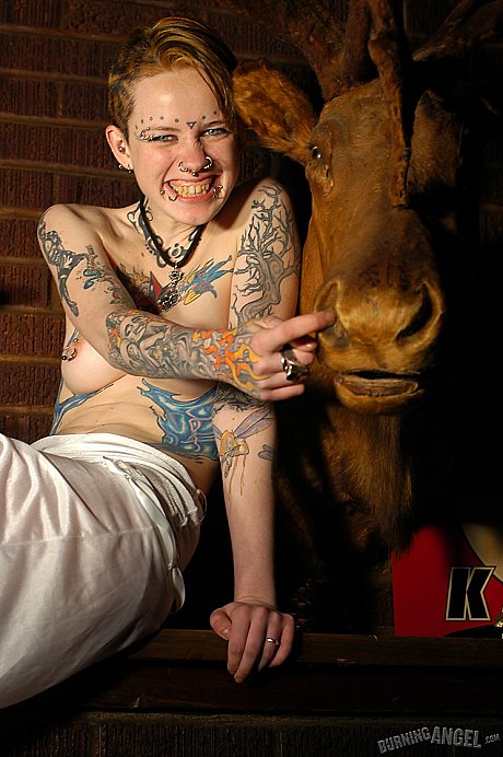 Babe with short hair and heavy tattoos is a striptease at an empty bar - Image 6 of 19  in Spreading category   featuring Rachel Face 