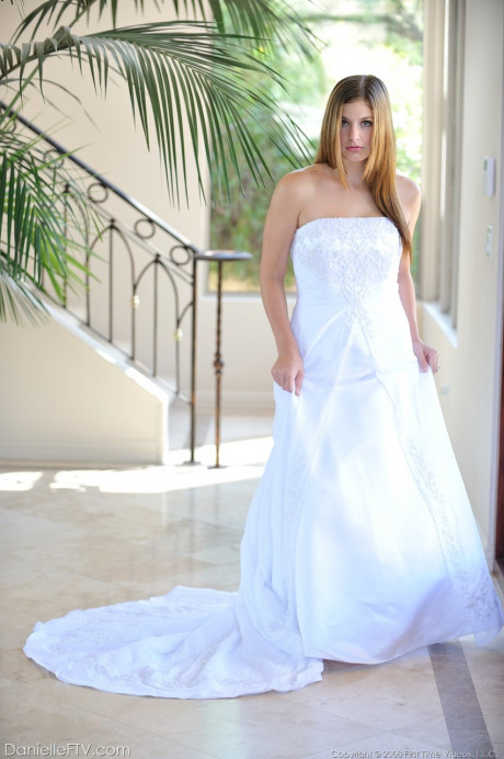 Busty glamorous amateur Danielle models wedding gown indoors & by the pool - #738761