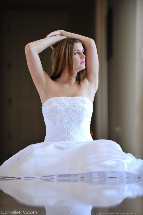 Busty glamorous amateur Danielle models wedding gown indoors & by the pool - #738766