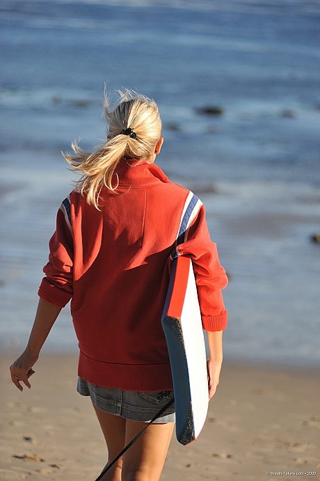 Blond female Jenni C puts down her board and exposes her melons and cunt instead - Image 2 of 12  in Outdoor category   featuring Jenni Gregg 