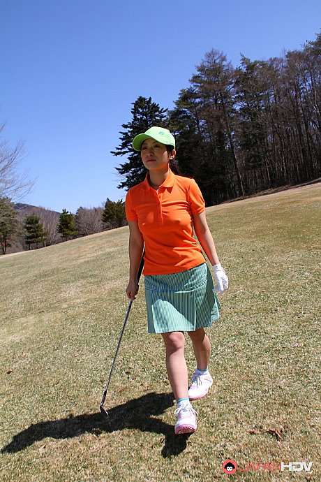 Japanese golfer Nana Kunimi flashes no panty upskirt while lining up a putt - Image 3 of 15  in Close Up category   featuring Nana Kunimi 