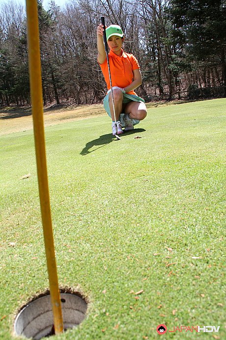 Japanese golfer Nana Kunimi flashes no panty upskirt while lining up a putt - Image 7 of 15  in Close Up category   featuring Nana Kunimi 