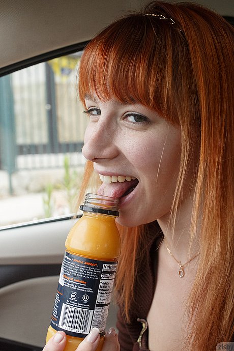 Shameless ginger head Penelope Lynn flashing her juicy titties and undies in public