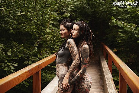 Heavily tattooed lesbians hold each other while totally nude on a bridge - Image 11 of 16  in Lesbian category   featuring Anuskatzz 