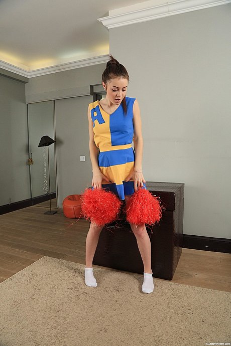 Sweet cheerleader Lou strips off her uniform and masturbates in a solo - Image 1 of 21  in Dildo category   featuring Lou 