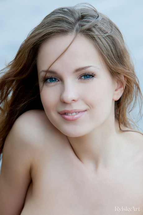 Euro model Ilze wears a smile on beautiful fine face during nude posing on dock - #336679