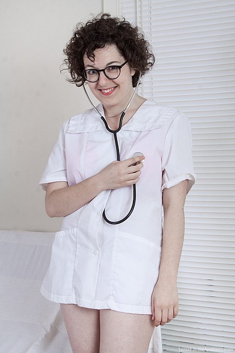 Wild nurse Tamar plays with her furry cunt on the hospital bed - Image 1 of 18  in Close Up category   featuring Tamar 