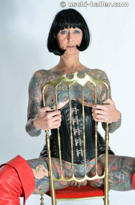 Solo skank gf woman Tattoogirl Cleo gets nude in a leather waist cincher and long boots - #1221321
