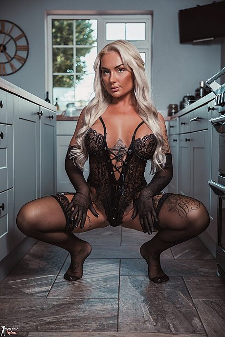 Tattooed blonde Charlotte Stevens releases her humongous tits from sensual lingerie - Image 3 of 12  in Model category   featuring Charlotte Stevens 