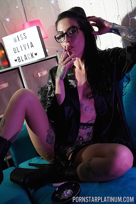 Inked pornstar Olivia ebony poses in gigantic heels and negligee while smoking - Gallery #19205