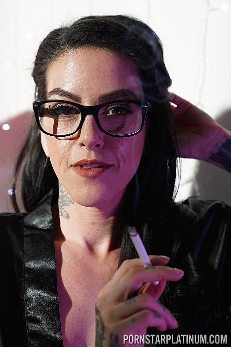 Inked pornstar Olivia ebony poses in gigantic heels and negligee while smoking - Image 13 of 20  in High Heels category   featuring Olivia Black 