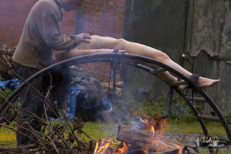 Naked brunette Ally Style is roasted over a fire during BDSM training - #922857