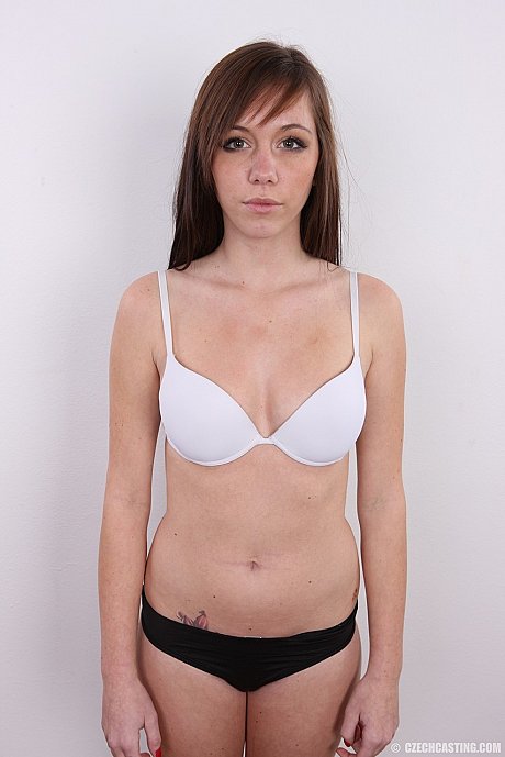 Amateur model with a flat chest discards her jeans to get undressed on a stool - Image 10 of 21  in Teen category   featuring Andrea 