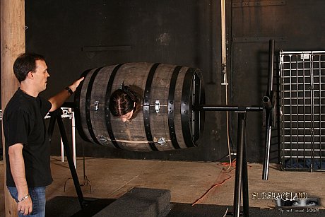 Pretty brunette in a bondage box Goldie giving head to a brutal BDSM handler - Image 10 of 20  in Pussy category   featuring Goldie 