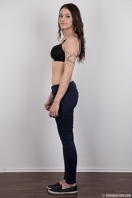 Brown eyes beauty Jolana strips to bareback her hot tattooed body for the camera