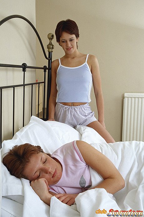 Fresh young lesbians engage in strapon sex after taking a snooze on a bed - Image 1 of 10  in Lesbian category  