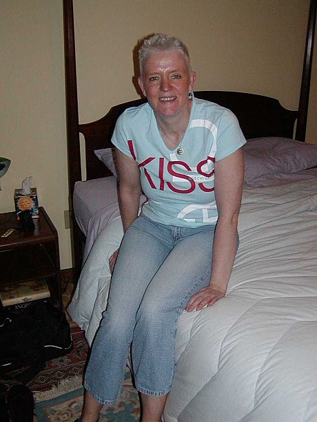 Older skank woman with short yellow-haired hair Tiffany Pearl gets undressed upon a bed - xxx porn gallery #49150 in Pussy featuring Tiffany Pearl