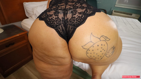SSBBW Strawberrys Delight shows her massive ass in ebony underwear