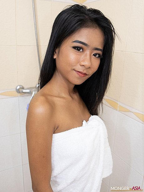 Hot oriental babe Som shows her sexy delicious titties & her shaved pussy in the bathroom - Image 1 of 20  in Babe category   featuring Som X 
