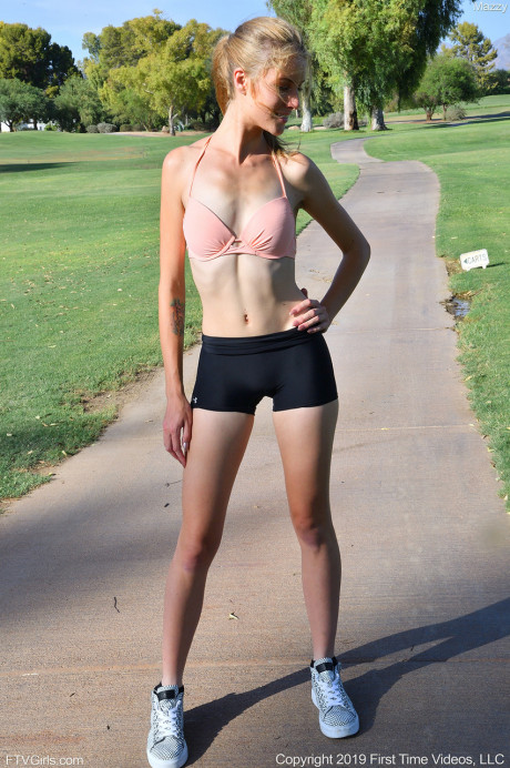 Slender blonde amateur Mazzy shows her small and butt titties and poses outdoors - #1071863