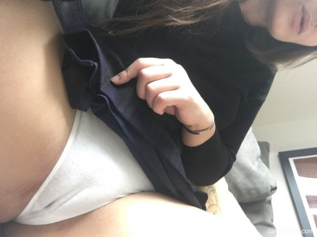 Ravishing babe Dani Daniels bares her teenie tits & shows her cameltoe - #1023717