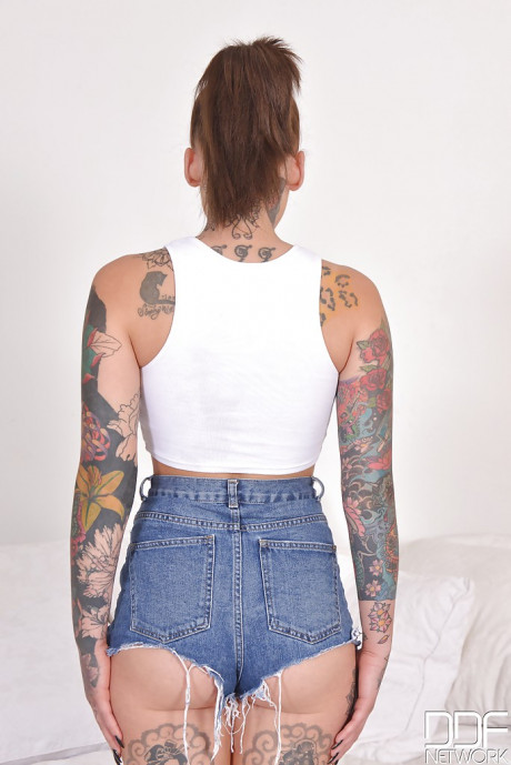 Heavily tattooed alt model Lauren revealing pierced vagina while posing naked - #94219