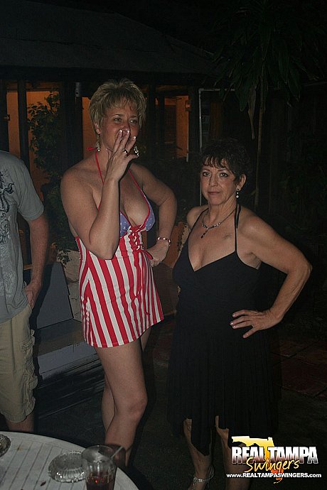 Playful amateur mature swinger wives teasing and French kissing at a party - Image 5 of 20  in Skirt category   featuring Tracy Lick, Dee Delmar 