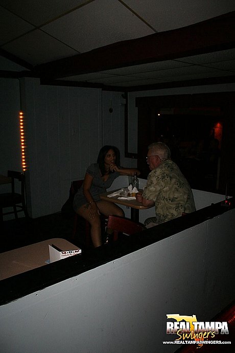 Playful amateur mature swinger wives teasing and French kissing at a party - Gallery #11663