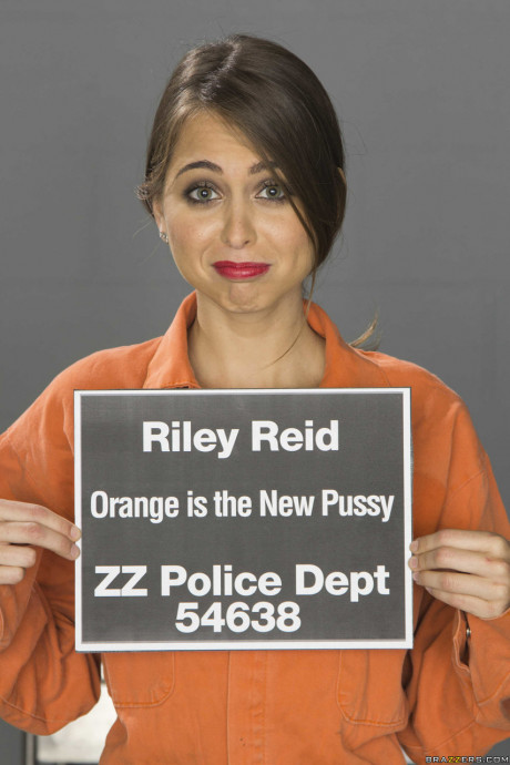 Skinny female Riley Reid rips off her prison jumper to model in the undressed - #530413