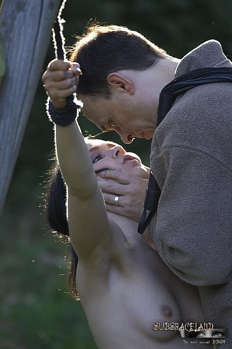 Undressed brunette Ally Style is roasted over a fire during BDSM training - Image 5 of 16  in Pussy category   featuring Ally Style 