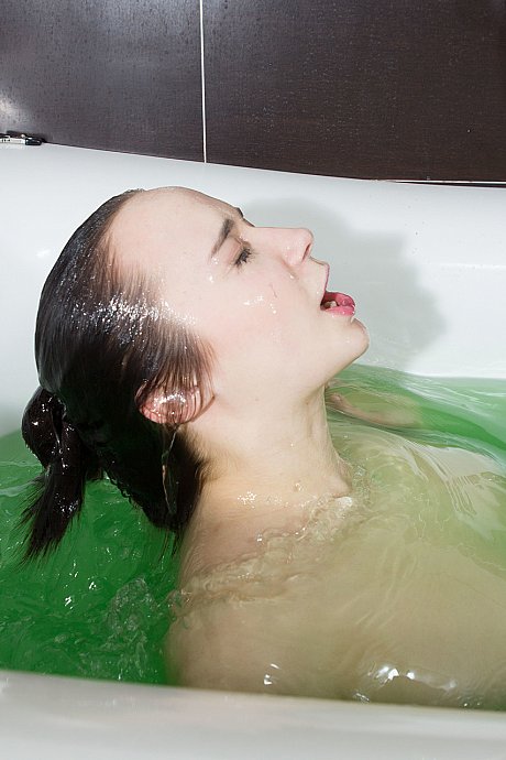 Glamorous young Ruta plays with her furry vagina during a bubble bath - Image 19 of 21  in Masturbation category   featuring Ruta 