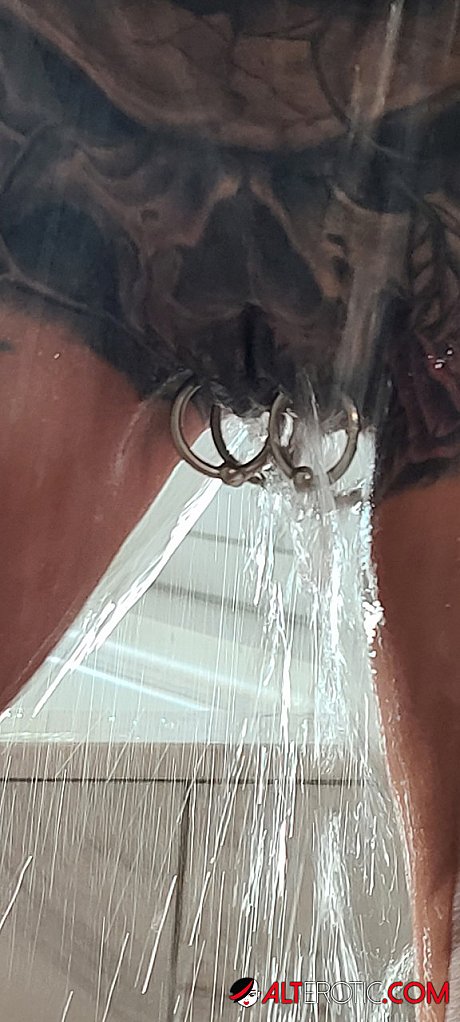Tatted older broad Marie Bossette highlights her pierced pussy while showering - Image 12 of 16  in Pussy category   featuring Marie Bossette 