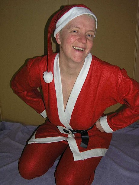 Older amateur Tiffany Pearl shows her boobies and twat in Christmas attire - Image 2 of 16  in Pussy category   featuring Tiffany Pearl 