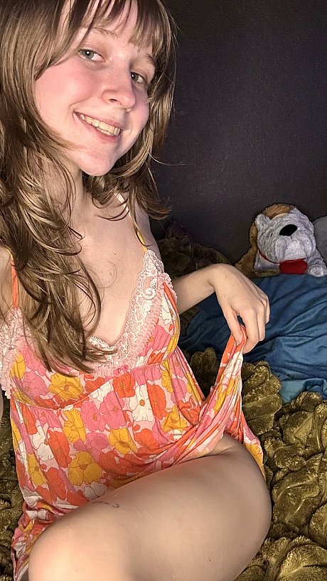 Attractive amateur young Teensy Bella poses seductively in her nightgown - Image 1 of 11  in Teen category   featuring Teensy Bella 