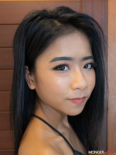 Pretty lovely oriental babe Som bares her sexy yummy melons in a hot tease in fetish wear - Image 3 of 20  in Amateur category   featuring Som 
