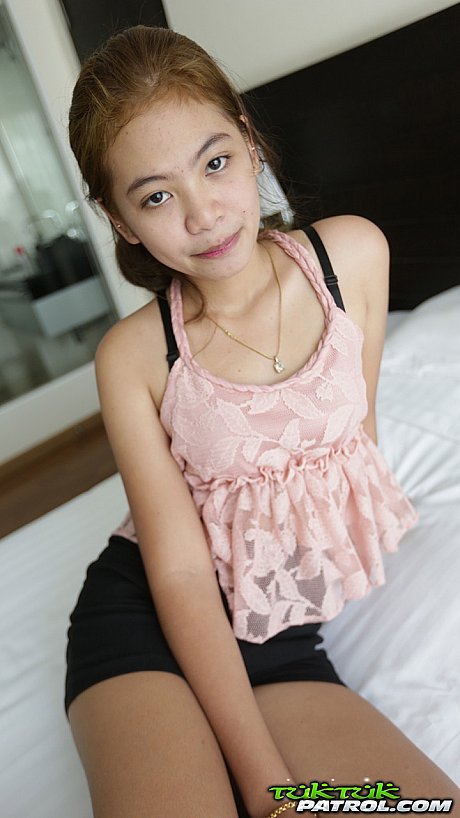 Skinny Thai bitch girl broad Mint strips off her clothes and shows her tiny silky vagina